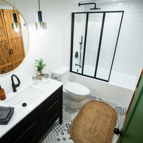 Bathroom with bath and shower